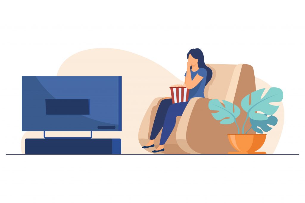 Woman watching movie or show in TV